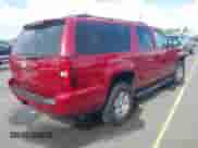 2013 Chevrolet Suburban LT z VIN 1GNSKJE77DR205791, wystawiony jako IAAI lot #43091004 z przebiegiem 184 633 mil mil oraz . Historia ofert i sprzedaży dostępna na DreamBid. Obrazek 4.