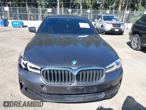 ✅ 2021 BMW 5 Series 530i • VIN: WBA53BH01MCF26218 • Lot: 42927073. Listed on IAAI with 38,048 mi. Free auction sales archive from the USA and detailed vehicle history report at DreamBid. Image 12.
