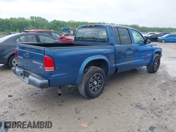 ✅ 2001 Dodge Dakota Sport • VIN: 1B7HG2AN21S194735 • Lot: 42182165. Wystawiony na IAAI z przebiegiem 163 350 mil. Bezpłatny archiwum sprzedaży aukcyjnych z USA i szczegółowy raport historii pojazdu na DreamBid. Zdjęcie 4.