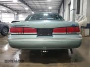 ✅ 1997 Ford Crown Victoria LX • VIN: 2FALP74W8VX231100 • Lot: 46806545. Listed on Copart with 156,739 mi. Free auction sales archive from the USA and detailed vehicle history report at DreamBid. Image 6.