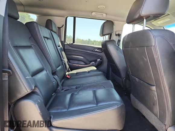 2019 Chevrolet Suburban Premier with VIN 1GNSCJKCXKR110511, listed as a Copart auction lot 71028945 with 87,669 mi miles and Salvage title. Bid and sale history available at DreamBid. Image 11.