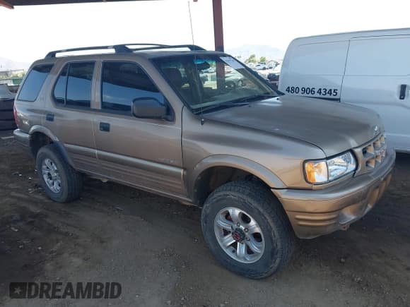 ✅ 2001 Isuzu Rodeo S • VIN: 4S2DM58W914345456 • Lot: 42967745. Wystawiony na IAAI z przebiegiem 183 996 mil. Bezpłatny archiwum sprzedaży aukcyjnych z USA i szczegółowy raport historii pojazdu na DreamBid. Zdjęcie 1.