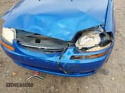 ✅ 2007 Chevrolet Aveo LS • VIN: KL1TD66647B748899 • Lot: 41126412. Wystawiony na IAAI z przebiegiem 124 187 mil. Bezpłatny archiwum sprzedaży aukcyjnych z USA i szczegółowy raport historii pojazdu na DreamBid. Zdjęcie 12.