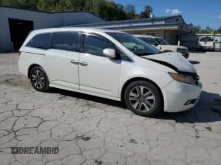✅ 2014 Honda Odyssey Touring • VIN: 5FNRL5H98EB107871 • Лот: 85380155. Опубликован ранее на Copart с пробегом 169 829 миль. Бесплатный доступ к архиву аукционных продаж из США и подробный отчёт об истории автомобиля на DreamBid. Изображение 4.
