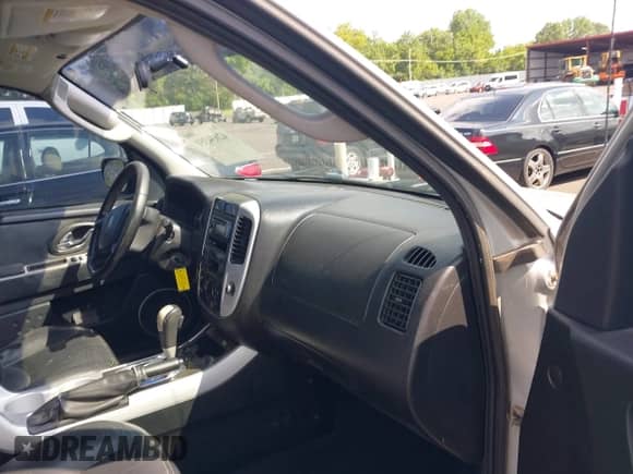 2006 Mercury Mariner Luxury с VIN 4M2YU56106KJ11501, выставлен на аукционе IAAI как лот 42634351 с пробегом 141 456 миль миль и . История ставок и продаж доступна на DreamBid. Изображение 5.