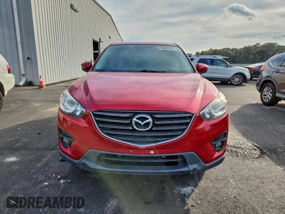 ✅ 2016 Mazda CX-5 Grand Touring • VIN: JM3KE2DYXG0772206 • Lot: 95505335. Listed on Copart with 106,791 mi. Free auction sales archive from the USA and detailed vehicle history report at DreamBid. Image 5.