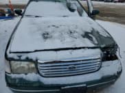 ✅ 2000 Ford Crown Victoria • VIN: 2FAFP73WXYX157746 • Lot: 82748804. Wystawiony na Copart z przebiegiem 56 820 mil. Bezpłatny archiwum sprzedaży aukcyjnych z USA i szczegółowy raport historii pojazdu na DreamBid. Zdjęcie 11.