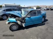 ✅ 1995 Saturn SC • VIN: 1G8ZE1280SZ225870 • Lot: 67038365. Listed on Copart with 272,917 mi. Free auction sales archive from the USA and detailed vehicle history report at DreamBid. Image 1.