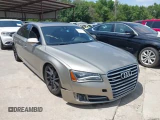 ✅ 2012 Audi A8 • VIN: WAURVAFD1CN010078 • Лот: 42768475. Опубликован ранее на IAAI с пробегом 140 384 миль. Бесплатный доступ к архиву аукционных продаж из США и подробный отчёт об истории автомобиля на DreamBid. Изображение 1.