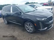 ✅ 2021 Cadillac XT6 Premium Luxury • VIN: 1GYKPCRS6MZ223987 • Лот: 42706657. Опубликован ранее на IAAI с пробегом 71 152 миль. Бесплатный доступ к архиву аукционных продаж из США и подробный отчёт об истории автомобиля на DreamBid. Изображение 1.