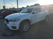 ✅ 2015 BMW X6 xDrive35i • VIN: 5UXKU2C54F0F95994 • Lot: 93351645. Listed on Copart with 164,540 mi. Free auction sales archive from the USA and detailed vehicle history report at DreamBid. Image 1.