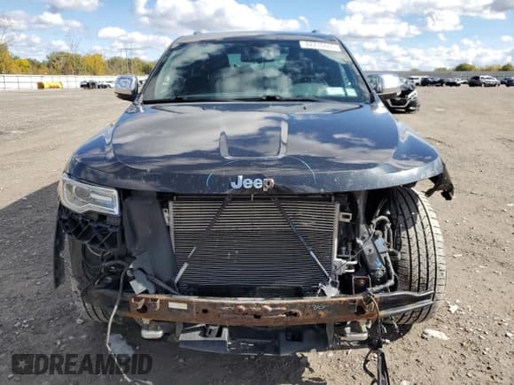 ✅ 2014 Jeep Grand Cherokee Overland • VIN: 1C4RJFCT0EC265195 • Lot: 82276605. Listed on Copart with 150,821 mi. Free auction sales archive from the USA and detailed vehicle history report at DreamBid. Image 5.