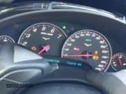 ✅ 2012 Chevrolet Corvette 1LT • VIN: 1G1YA2DW9C5103900 • Lot: 43733702. Wystawiony na IAAI z przebiegiem 71 072 mil. Bezpłatny archiwum sprzedaży aukcyjnych z USA i szczegółowy raport historii pojazdu na DreamBid. Zdjęcie 7.