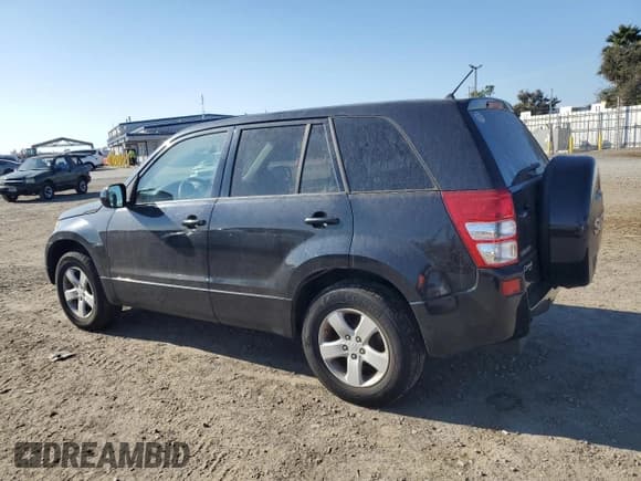 ✅ 2011 Suzuki Grand Vitara Premium • VIN: JS3TD0D24B4101018 • Lot: 79105834. Listed on Copart with 120,605 mi. Free auction sales archive from the USA and detailed vehicle history report at DreamBid. Image 2.