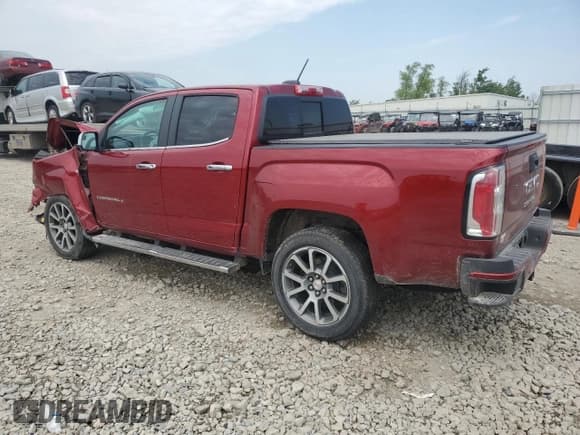 ✅ 2021 GMC Canyon 4WD Denali • VIN: 1GTG6EEN4M1126411 • Лот: 60708125. Опубликован ранее на Copart с пробегом 52 323 миль. Бесплатный доступ к архиву аукционных продаж из США и подробный отчёт об истории автомобиля на DreamBid. Изображение 2.