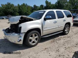 2008 Chevrolet Tahoe LTZ с VIN 1GNFC13J98R217332, выставлен на аукционе Copart как лот 70231695 с пробегом 201 502 миль миль и Списание • Salvage title. История ставок и продаж доступна на DreamBid. Изображение 1.