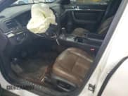 ✅ 2013 Lincoln MKS • VIN: 1LNHL9DK4DG613144 • Lot: 54354625. Listed on Copart with 104,211 mi. Free auction sales archive from the USA and detailed vehicle history report at DreamBid. Image 7.