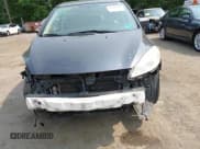 ✅ 2012 Mazda 5 Touring • VIN: JM1CW2CL5C0126744 • Lot: 42385667. Listed on IAAI with 140,150 mi. Free auction sales archive from the USA and detailed vehicle history report at DreamBid. Image 12.