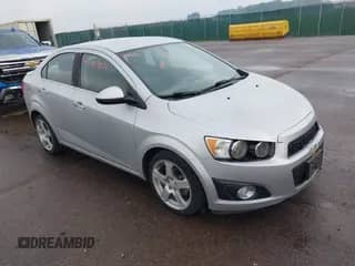 ✅ 2015 Chevrolet Sonic LTZ • VIN: 1G1JE5SB2F4123973 • Лот: 42428071. Размещён на IAAI с пробегом 137 672 миль миль. Получите бесплатный доступ к архиву аукционных продаж из США и посмотрите подробный отчёт об истории автомобиля на DreamBid. Изображение 1.