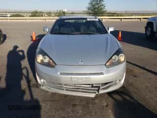 2008 Hyundai Tiburon GS с VIN KMHHM66D48U293082, выставлен на аукционе Copart как лот 64401385 с пробегом 71 163 миль миль и Списание • Salvage title. История ставок и продаж доступна на DreamBid. Изображение 5.