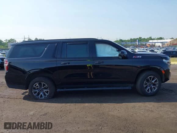 ✅ 2023 Chevrolet Suburban Z71 • VIN: 1GNSKDKD0PR327831 • Lot: 42449967. Listed on IAAI with 68,920 mi. Free auction sales archive from the USA and detailed vehicle history report at DreamBid. Image 13.