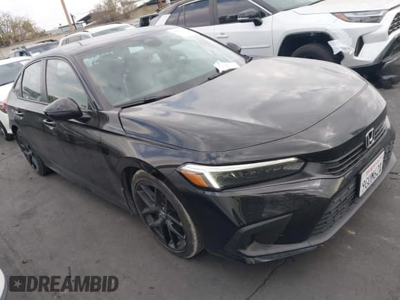 ✅ 2023 Honda Civic Sport • VIN: 2HGFE2F57PH557229 • Lot: 43693355. Listed on IAAI with 22,110 mi. Free auction sales archive from the USA and detailed vehicle history report at DreamBid. Image 1.