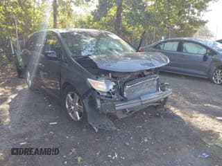 ✅ 2012 Honda Odyssey Touring • VIN: 5FNRL5H94CB082173 • Lot: 43299146. Listed on IAAI with Not provided. Free auction sales archive from the USA and detailed vehicle history report at DreamBid. Image 1.