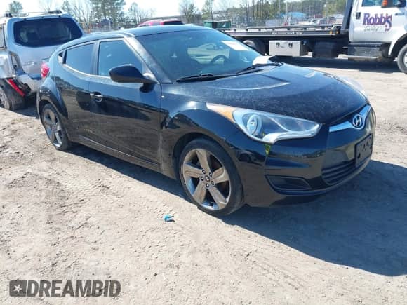 2012 Hyundai Veloster w/Black Int with VIN KMHTC6AD8CU046029, listed as a IAAI auction lot 41664151 with 163,523 mi miles and . Bid and sale history available at DreamBid. Image 1.