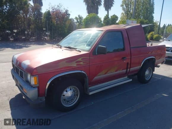 ✅ 1993 Nissan Frontier • VIN: 1N6SD11S5PC337045 • Lot: 43106354. Listed on IAAI with 142,131 mi. Free auction sales archive from the USA and detailed vehicle history report at DreamBid. Image 2.