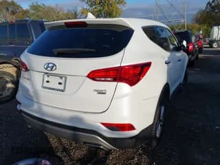 ✅ 2017 Hyundai Santa Fe 2.4L • VIN: 5NMZTDLB0HH023101 • Лот: 43494022. Опубликован ранее на IAAI с пробегом 104 605 миль. Бесплатный доступ к архиву аукционных продаж из США и подробный отчёт об истории автомобиля на DreamBid. Изображение 4.