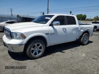 ✅ 2016 Ram 1500 Laramie • VIN: 1C6RR6NM4GS179290 • Лот: 64322415. Опубликован ранее на Copart с пробегом 143 522 миль. Бесплатный доступ к архиву аукционных продаж из США и подробный отчёт об истории автомобиля на DreamBid. Изображение 1.