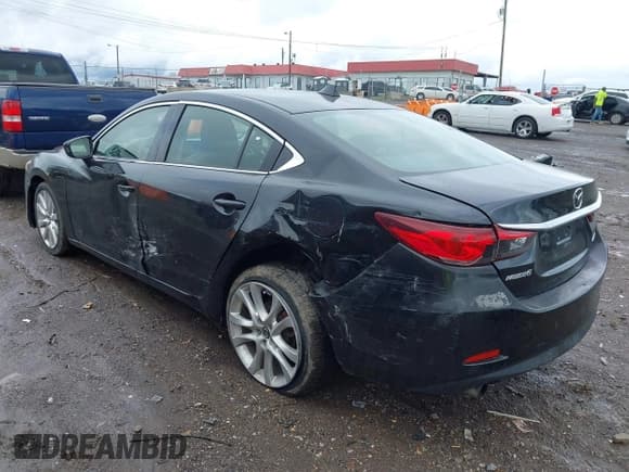 ✅ 2014 Mazda 6 i Touring • VIN: JM1GJ1V5XE1102011 • Lot: 43402861. Wystawiony na IAAI z przebiegiem 187 012 mil. Bezpłatny archiwum sprzedaży aukcyjnych z USA i szczegółowy raport historii pojazdu na DreamBid. Zdjęcie 3.