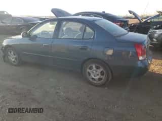 2003 Hyundai Elantra GLS z VIN KMHDN45D83U598594, wystawiony jako Copart lot #76713594 z przebiegiem 138 884 mil mil oraz Szkoda całkowita • Salvage title. Historia ofert i sprzedaży dostępna na DreamBid. Obrazek 2.