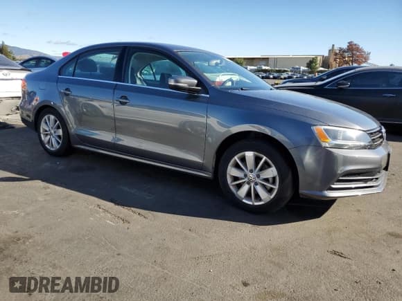 ✅ 2015 Volkswagen Jetta SE • VIN: 3VWD17AJ7FM268058 • Lot: 85205095. Listed on Copart with 64,778 mi. Free auction sales archive from the USA and detailed vehicle history report at DreamBid. Image 4.