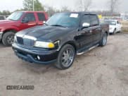 ✅ 2002 Lincoln Blackwood • VIN: 5LTEW05A02KJ01579 • Lot: 41408693. Listed on IAAI with Not provided. Free auction sales archive from the USA and detailed vehicle history report at DreamBid. Image 2.