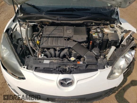 ✅ 2011 Mazda 2 Sport • VIN: JM1DE1HY5B0130801 • Лот: 70576514. Опубликован ранее на Copart с пробегом 137 075 миль. Бесплатный доступ к архиву аукционных продаж из США и подробный отчёт об истории автомобиля на DreamBid. Изображение 12.