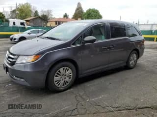 ✅ 2015 Honda Odyssey LX • VIN: 5FNRL5H24FB094394 • Лот: 71514625. Опубликован ранее на Copart с пробегом 85 928 миль. Бесплатный доступ к архиву аукционных продаж из США и подробный отчёт об истории автомобиля на DreamBid. Изображение 1.