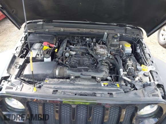 ✅ 2023 Jeep Wrangler Sport S • VIN: 1C4HJXDN6PW599895 • Lot: 42242107. Wystawiony na IAAI z przebiegiem 53 980 mil. Bezpłatny archiwum sprzedaży aukcyjnych z USA i szczegółowy raport historii pojazdu na DreamBid. Zdjęcie 10.