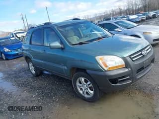✅ 2005 Kia Sportage LX • VIN: KNDJE723357058608 • Lot: 41564533. Listed on IAAI with 262,794 mi. Free auction sales archive from the USA and detailed vehicle history report at DreamBid. Image 1.