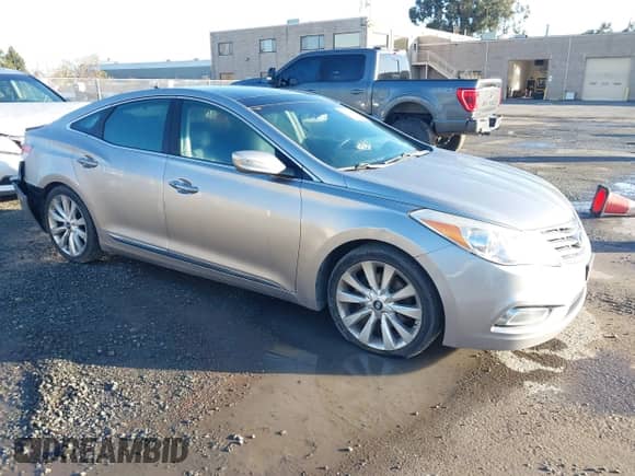 ✅ 2013 Hyundai Azera • VIN: KMHFH4JG3DA230844 • Lot: 41817997. Wystawiony na IAAI z przebiegiem 129 163 mil mil. Skorzystaj z bezpłatnego archiwum sprzedaży aukcyjnych z USA i zobacz szczegółowy raport historii pojazdu na DreamBid. Zdjęcie 1.