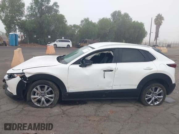 ✅ 2022 Mazda CX-30 S Select • VIN: 3MVDMBBL6NM427582 • Lot: 43541110. Wystawiony na IAAI z przebiegiem 33 599 mil. Bezpłatny archiwum sprzedaży aukcyjnych z USA i szczegółowy raport historii pojazdu na DreamBid. Zdjęcie 14.