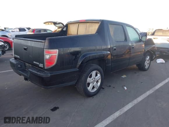 ✅ 2012 Honda Ridgeline RTL • VIN: 5FPYK1F59CB453794 • Лот: 43490365. Опубликован ранее на IAAI с пробегом 162 704 миль. Бесплатный доступ к архиву аукционных продаж из США и подробный отчёт об истории автомобиля на DreamBid. Изображение 4.