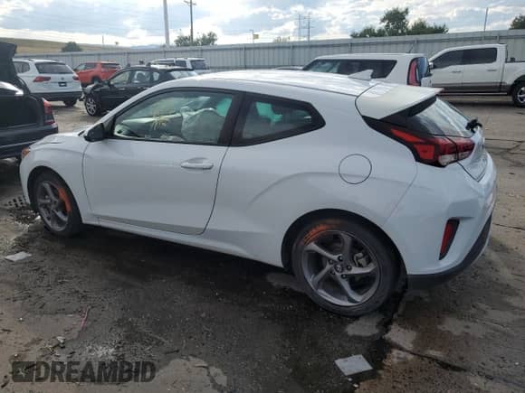 2020 Hyundai Veloster 2.0 z VIN KMHTG6AF9LU022229, wystawiony jako Copart lot #69515054 z przebiegiem Nie podano mil oraz Szkoda całkowita • Salvage title. Historia ofert i sprzedaży dostępna na DreamBid. Obrazek 2.