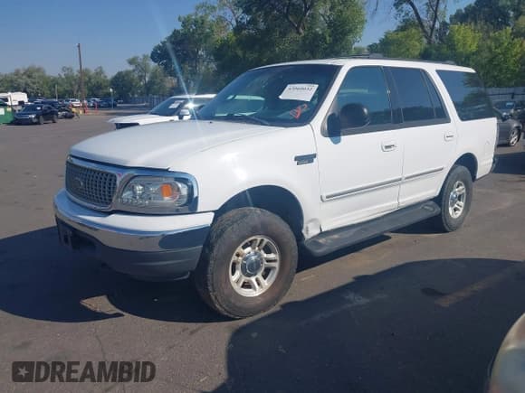 ✅ 2001 Ford Expedition XLT • VIN: 1FMRU16W61LA66576 • Lot: 43060032. Listed on IAAI with 165,289 mi. Free auction sales archive from the USA and detailed vehicle history report at DreamBid. Image 2.