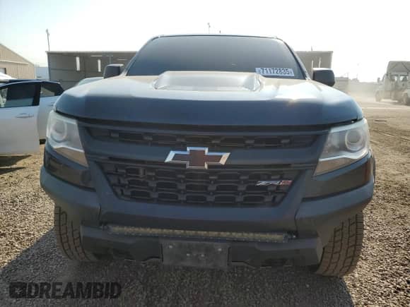 2018 Chevrolet Colorado 4WD ZR2 with VIN 1GCGTEEN7J1206189, listed as a Copart auction lot 71172835 with 136,672 mi miles and Salvage title. Bid and sale history available at DreamBid. Image 5.