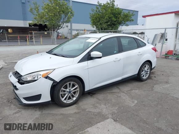 ✅ 2018 Ford Focus SE • VIN: 1FADP3FE0JL331278 • Lot: 43682633. Listed on IAAI with 99,011 mi. Free auction sales archive from the USA and detailed vehicle history report at DreamBid. Image 17.
