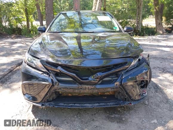 2022 Toyota Camry SE z VIN 4T1G11AK7NU068339, wystawiony jako IAAI lot #42534773 z przebiegiem 33 661 mil mil oraz . Historia ofert i sprzedaży dostępna na DreamBid. Obrazek 12.