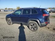 ✅ 2014 Jeep Cherokee Trailhawk • VIN: 1C4PJMBBXEW162594 • Lot: 89446585. Listed on Copart with 141,879 mi. Free auction sales archive from the USA and detailed vehicle history report at DreamBid. Image 2.