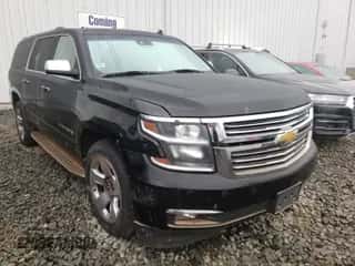 2015 Chevrolet Suburban LTZ z VIN 1GNSKKKC8FR297066, wystawiony jako Copart lot #60184591 z przebiegiem 141 470 mil mil oraz Szkoda całkowita • Salvage title. Historia ofert i sprzedaży dostępna na DreamBid. Obrazek 1.