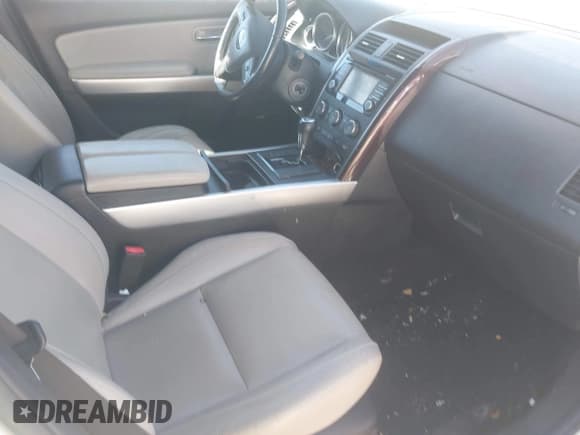 ✅ 2013 Mazda CX-9 Grand Touring • VIN: JM3TB2DA6D0424463 • Lot: 43422400. Wystawiony na IAAI z przebiegiem 123 157 mil. Bezpłatny archiwum sprzedaży aukcyjnych z USA i szczegółowy raport historii pojazdu na DreamBid. Zdjęcie 5.